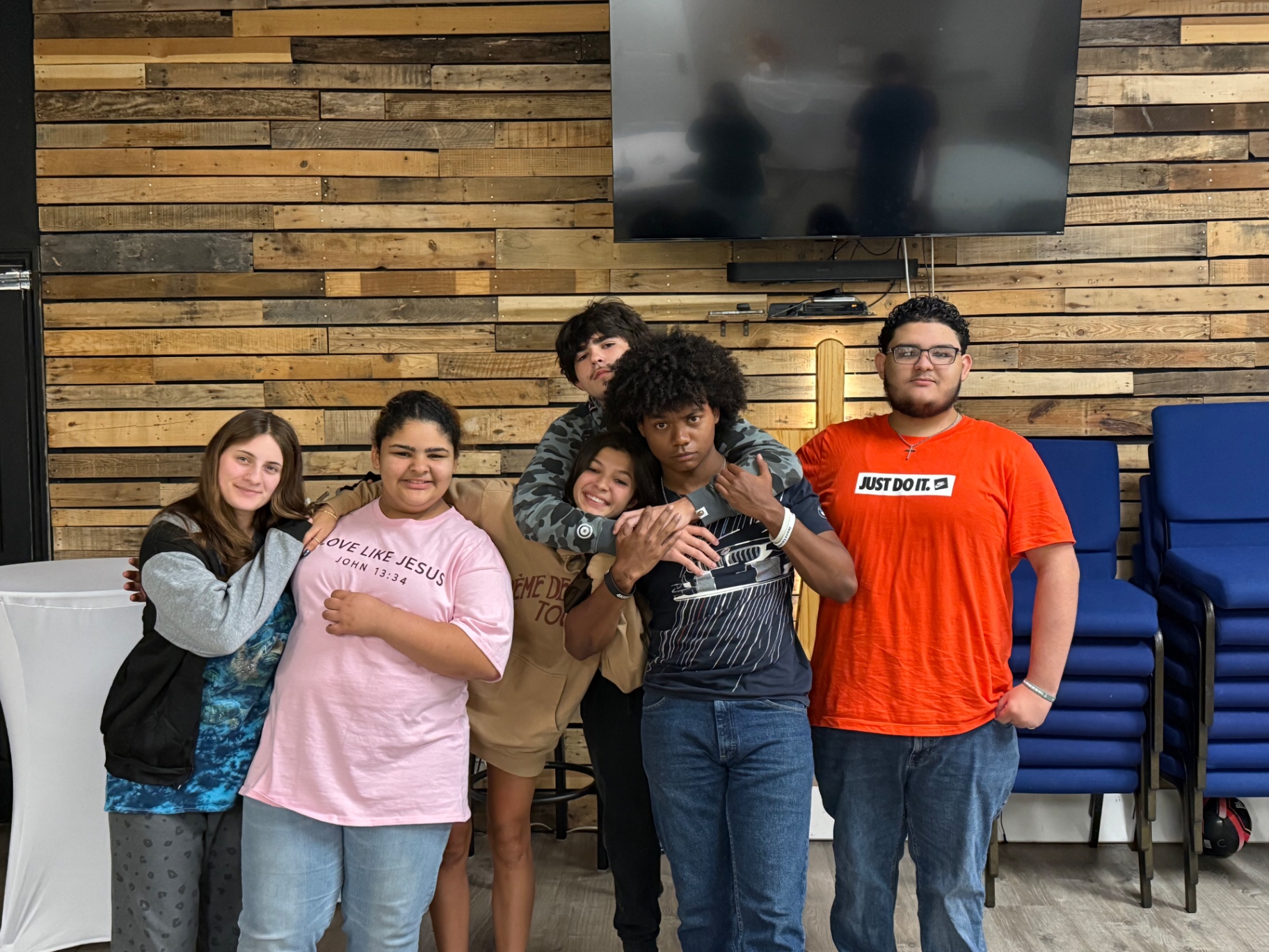 Students goofing off together in the gathering room
