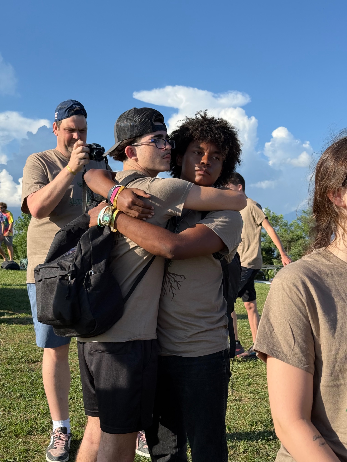 Two students embracing on the last night of camp