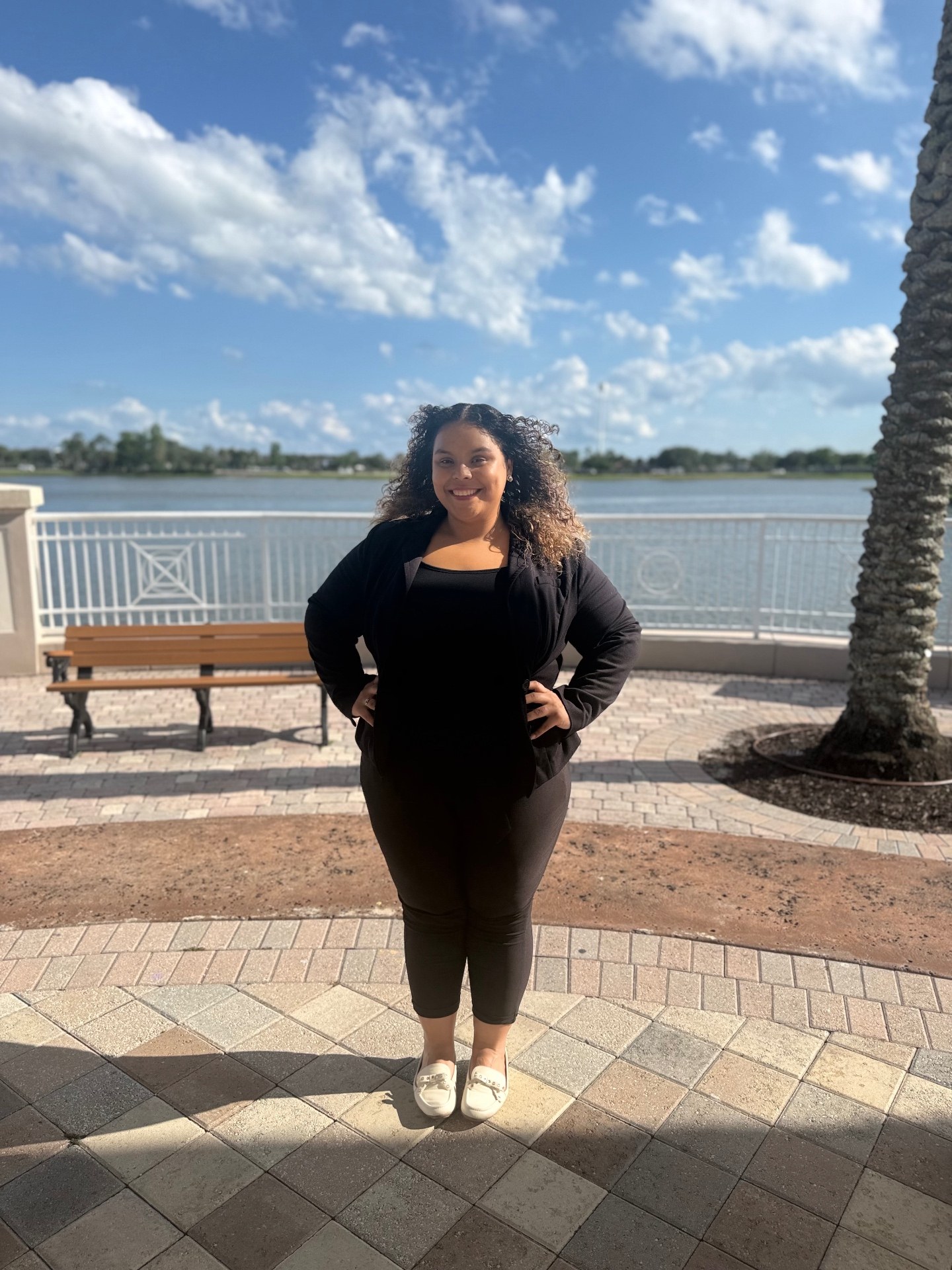 Bryanna, founder of Uncommon Ground Initiative, on a lakeside walkway